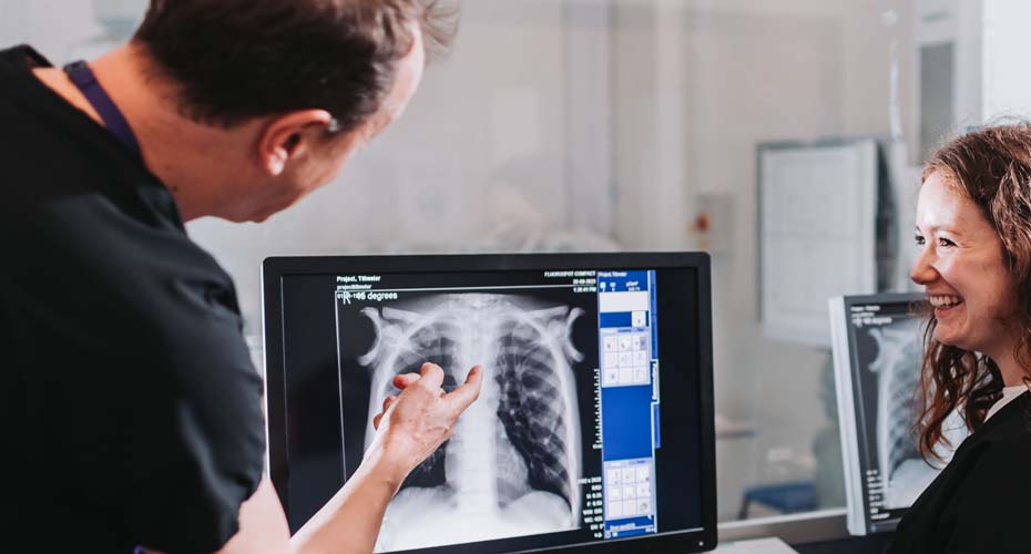 Medical Imaging students looking at chest Xray on computer screen